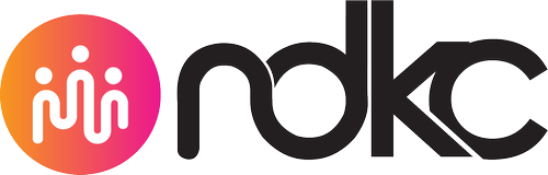 No Divide Logo: Orange circle with three people in it and letters NDKC